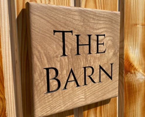 The Barn Sign dogs and people